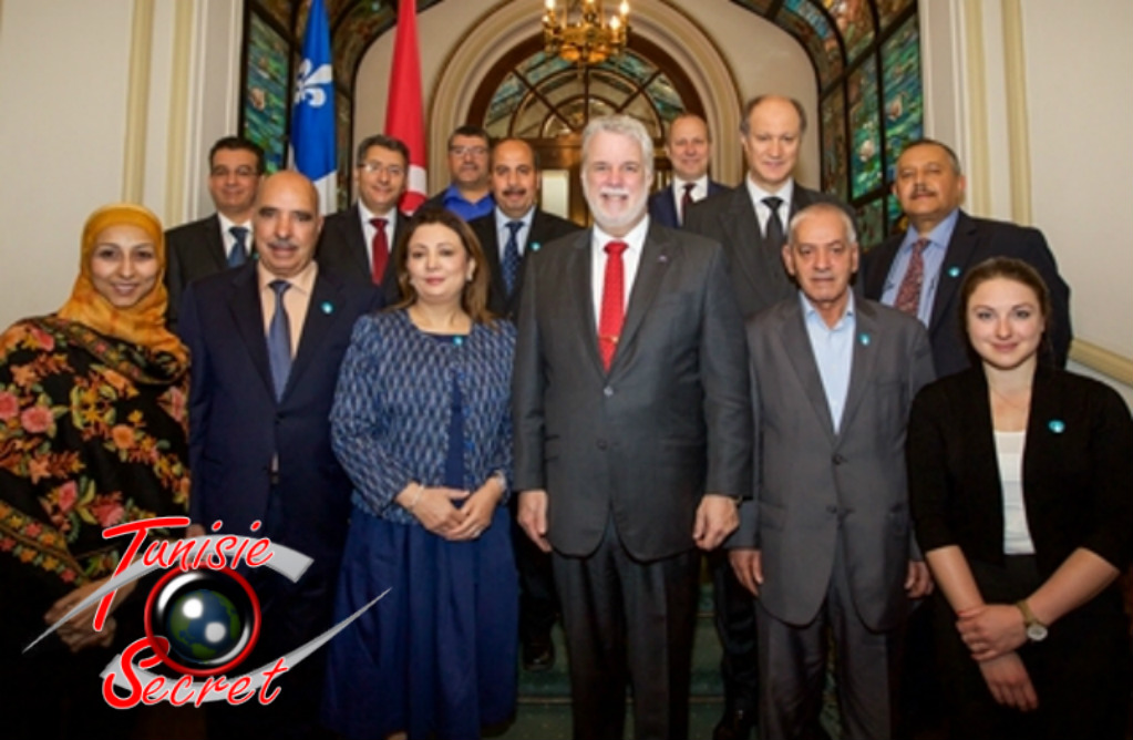 Photo du quartet du "dialogue national" avec le premier ministre canadian Philippe Couillard, le 16 mai 2016 au Québec.