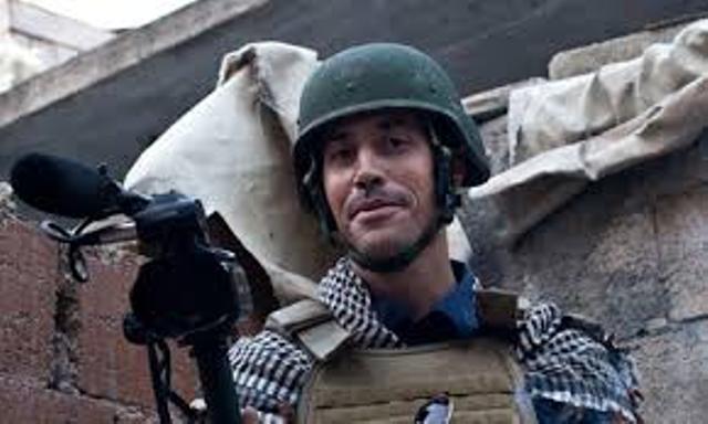 Le journaliste américain James Foley couvrant la "révolution" libyenne, c'est-à-dire l'invasion impérialiste et néocolonialiste de la Jamahiriyya libyenne.