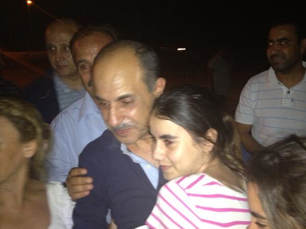 Mohamed Ghariani et sa fille, à sa sortie de prison le 10 juillet 2013.